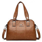 شنطة يد نسائية عصرية من الجلد المرن - بني - KSA