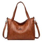 شنطة يد كبيرة جلدية مميزة بتصميم فريد - بنى - KSA