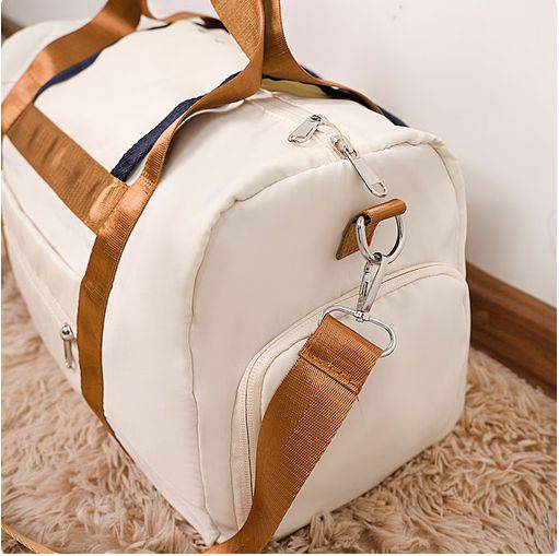 شنطة رياضية دفل مقاومة للماء - ابيض - KSA