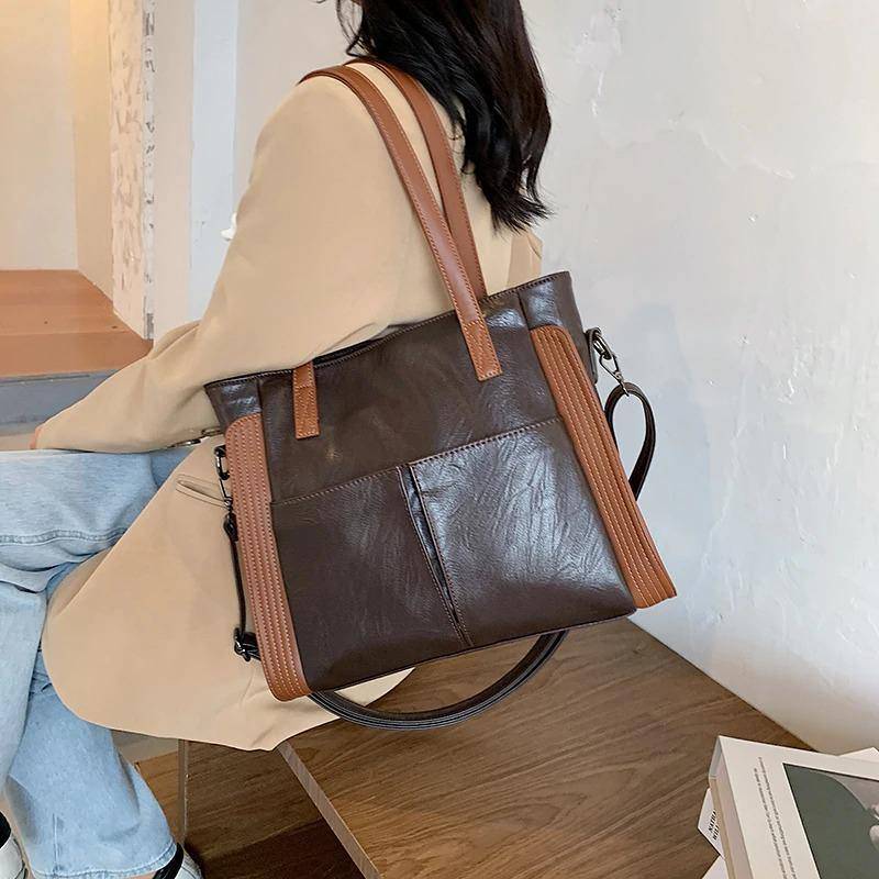 شنطة يد نسائية عصرية من الجلد المرن - بنى - KSA