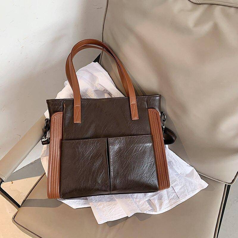 شنطة يد نسائية عصرية من الجلد المرن - بنى - KSA