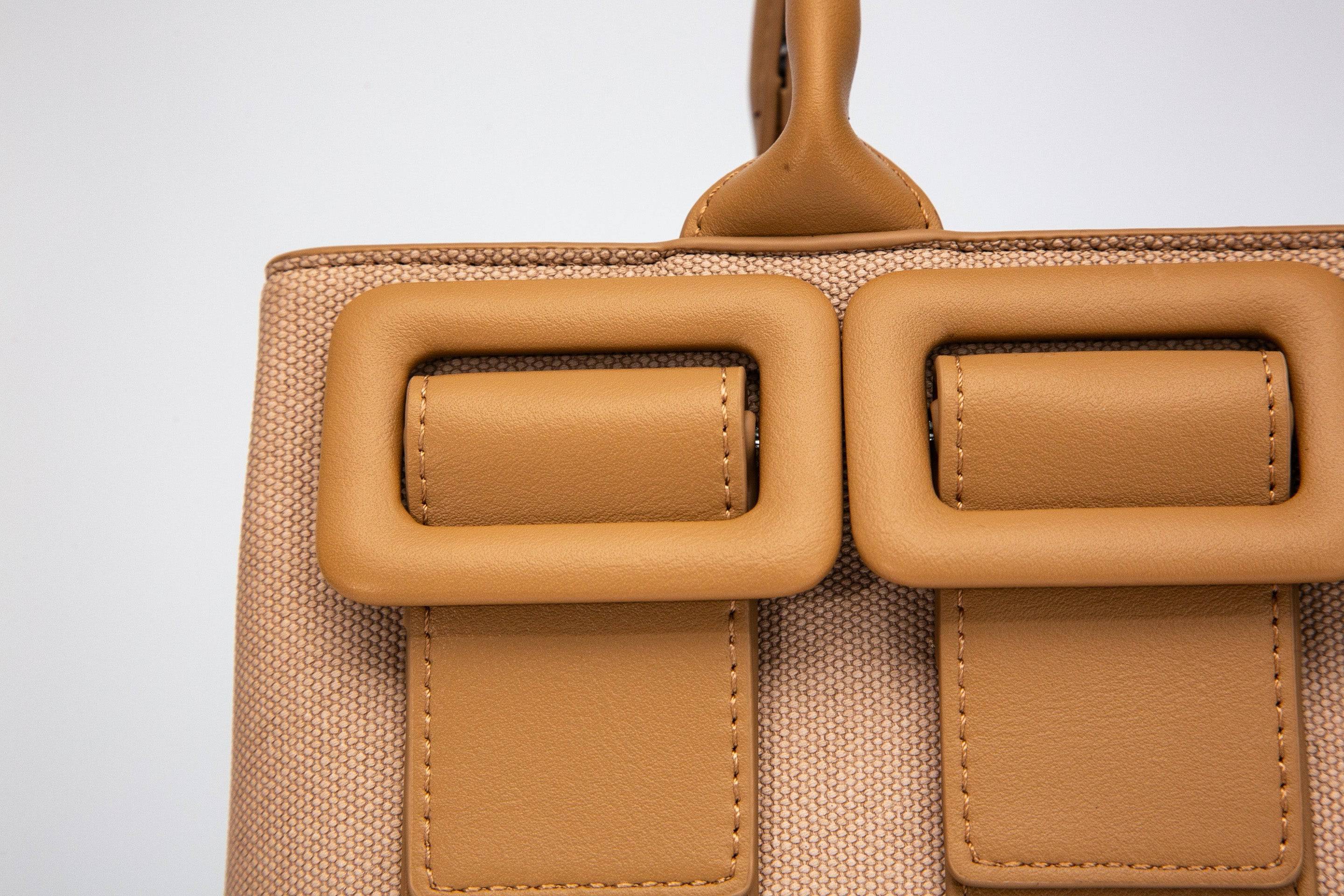 حقيبة نسائية فخمة باللون الاسود مناسبة لأوقات العمل والاحتفالات . - KSA