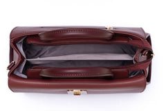 حقيبة يد نسائية متوسطة الحجم باللون العنابى بيد مزدوجة متينة. - KSA