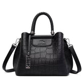 حقيبة أنيقة باللون الاسود بيد ضفيرة وحزام طويل للكتف - KSA