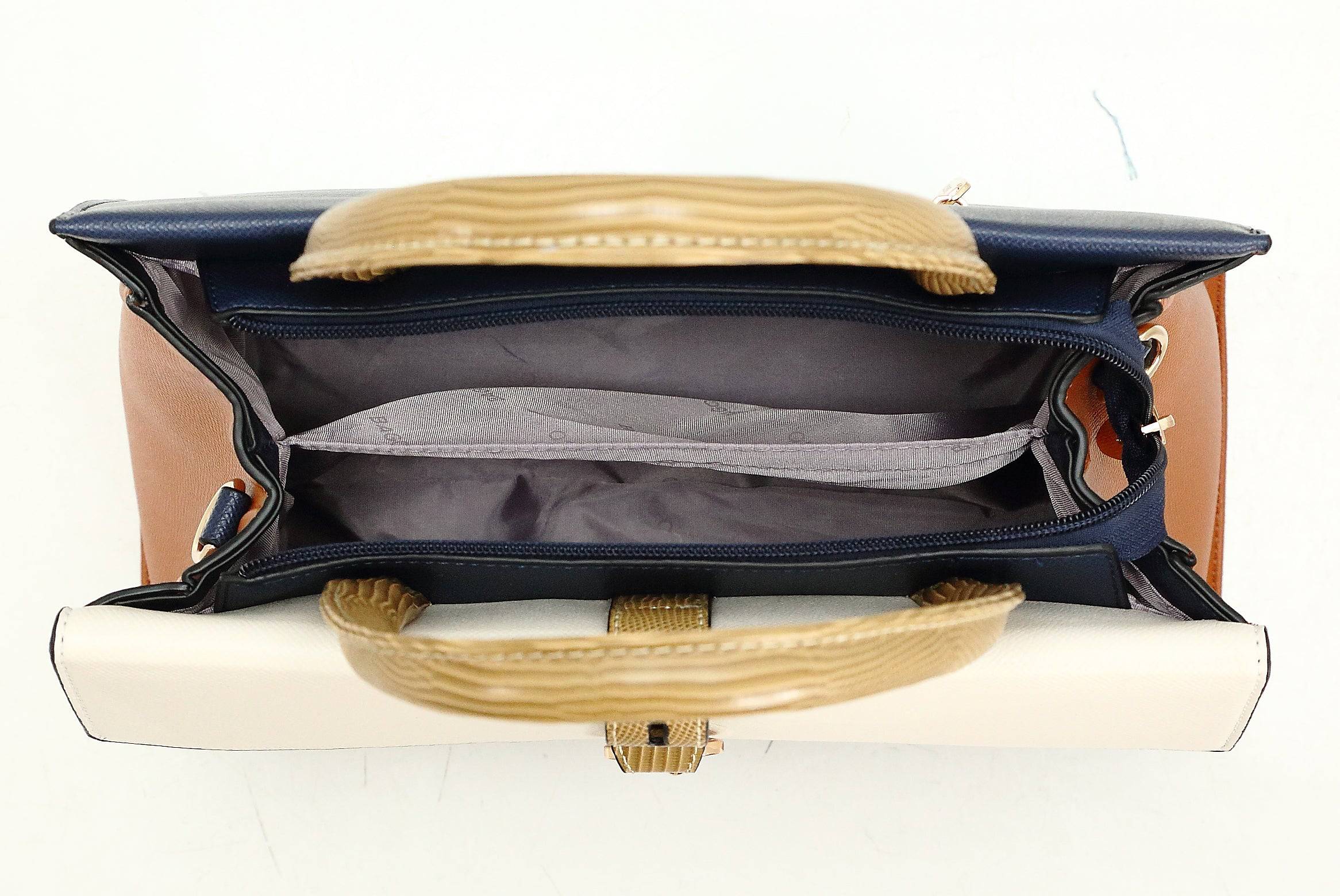 حقيبة يد نسائية متوسطة الحجم تجمع بين أكثر من لون تناسب المرأة العصرية التي تبحث عن كل جديد. - KSA