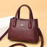 شنطة يد نسائية صغيرة من الجلد بتصميم كلاسيكي رقيق - عنابي - KSA