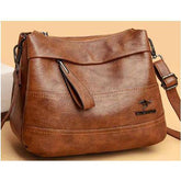 شنطة كروس نسائية مزركشة - بنى - KSA