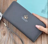 محفظة نسائية طويلة لون رمادي مع زخرفة ذهبي - KSA