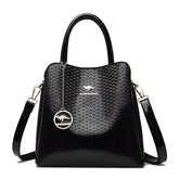 حقيبة يد نسائية كبيرة الحجم لون أسود لامع - KSA