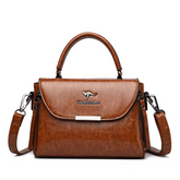 حقيبة يد نسائية متوسطة الحجم بمساحات منظمة لون بني - KSA