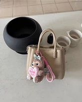 حقيبة يد نسائية صغيرة أنيقة مع حليّة جذابة لون بيج - KSA