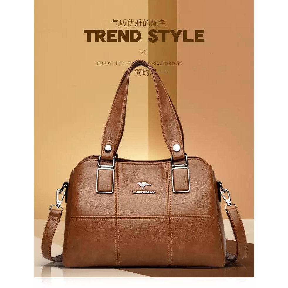 شنطة يد نسائية عصرية من الجلد المرن - بني - KSA