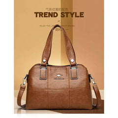 شنطة يد نسائية عصرية من الجلد المرن - بني - KSA