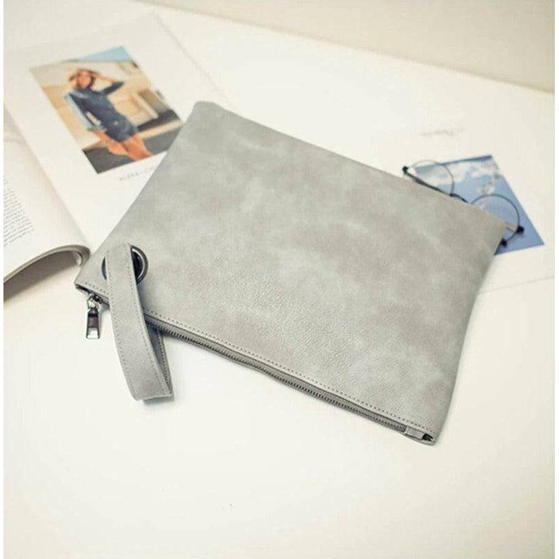شنطة يد نسائية من الجلد بتصميم بسيط وراقي - رمادى - KSA
