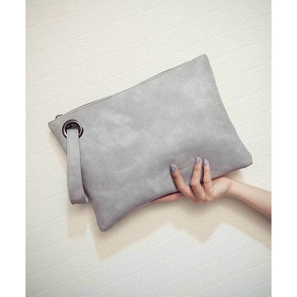 شنطة يد نسائية من الجلد بتصميم بسيط وراقي - رمادى - KSA