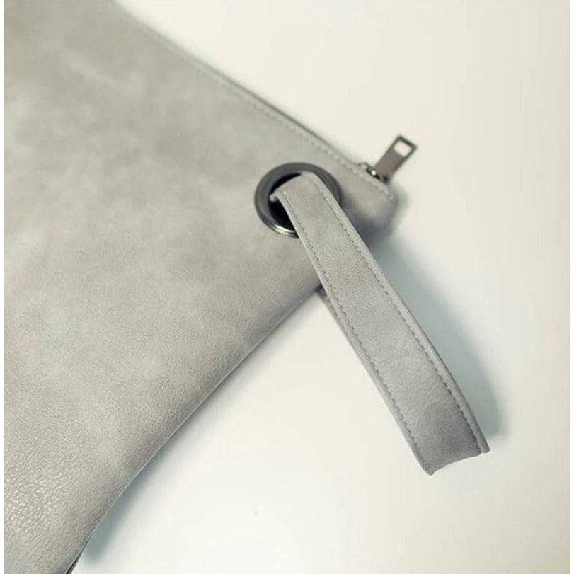 شنطة يد نسائية من الجلد بتصميم بسيط وراقي - رمادى - KSA