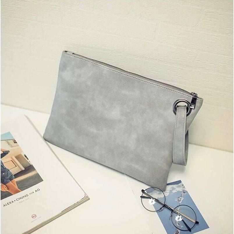 شنطة يد نسائية من الجلد بتصميم بسيط وراقي - رمادى - KSA