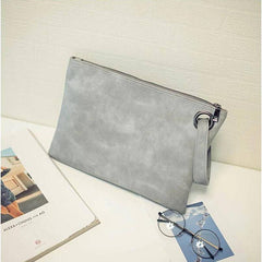 شنطة يد نسائية من الجلد بتصميم بسيط وراقي - رمادى - KSA