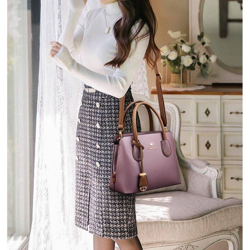 شنطة يد نسائية جلدية بإطلاله ناعمه - بنفسجي - KSA