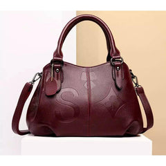 شنطة يد نسائية عصرية من الجلد المرن - عنابي - KSA