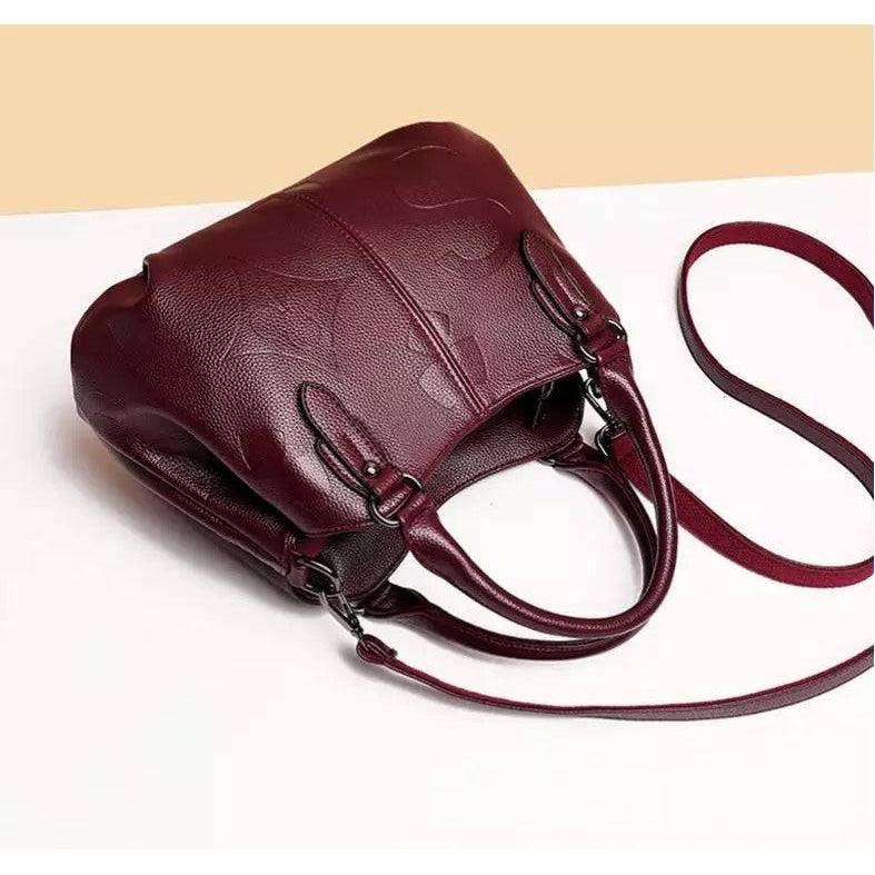 شنطة يد نسائية عصرية من الجلد المرن - عنابي - KSA