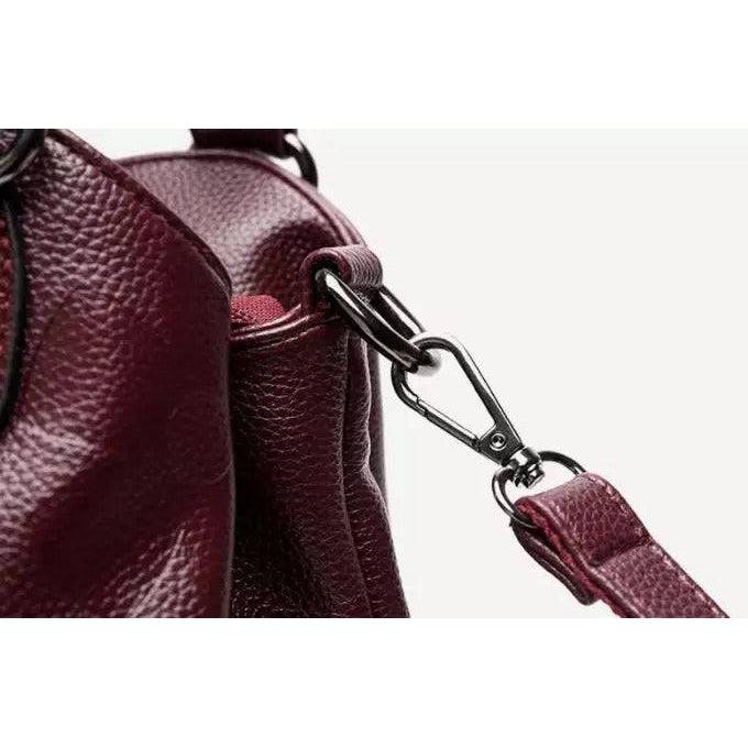 شنطة يد نسائية عصرية من الجلد المرن - عنابي - KSA