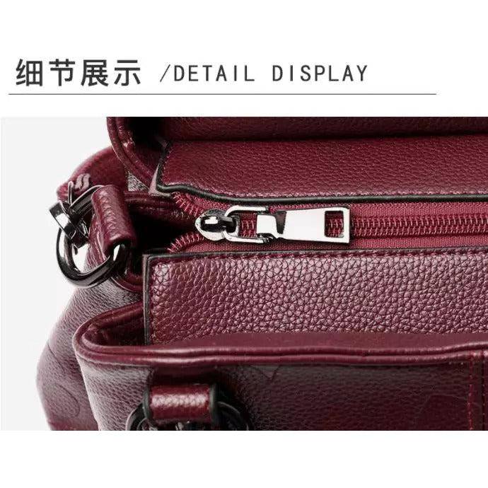 شنطة يد نسائية عصرية من الجلد المرن - عنابي - KSA