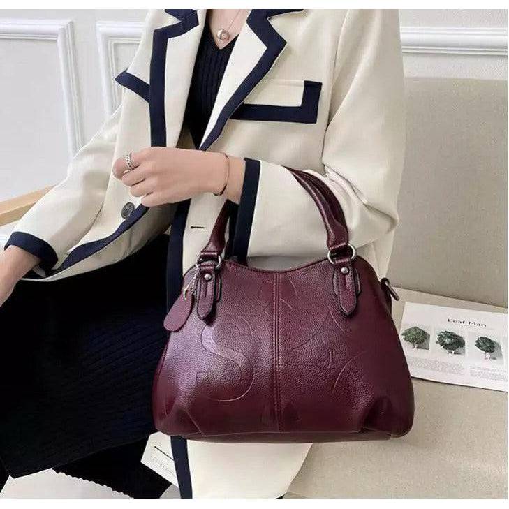 شنطة يد نسائية عصرية من الجلد المرن - عنابي - KSA