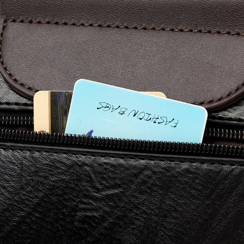 حقيبة باللون البني صغيرة بيد صغيرة وحزام طويل لحملها على الكتف. - KSA