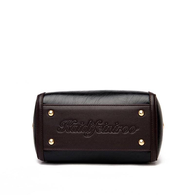 حقيبة باللون البني صغيرة بيد صغيرة وحزام طويل لحملها على الكتف. - KSA