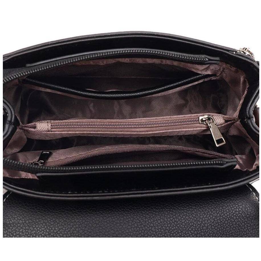 شنطة يد صغيرة نسائية عملية من الجلد تزيد من أناقتكِ - اسود - KSA