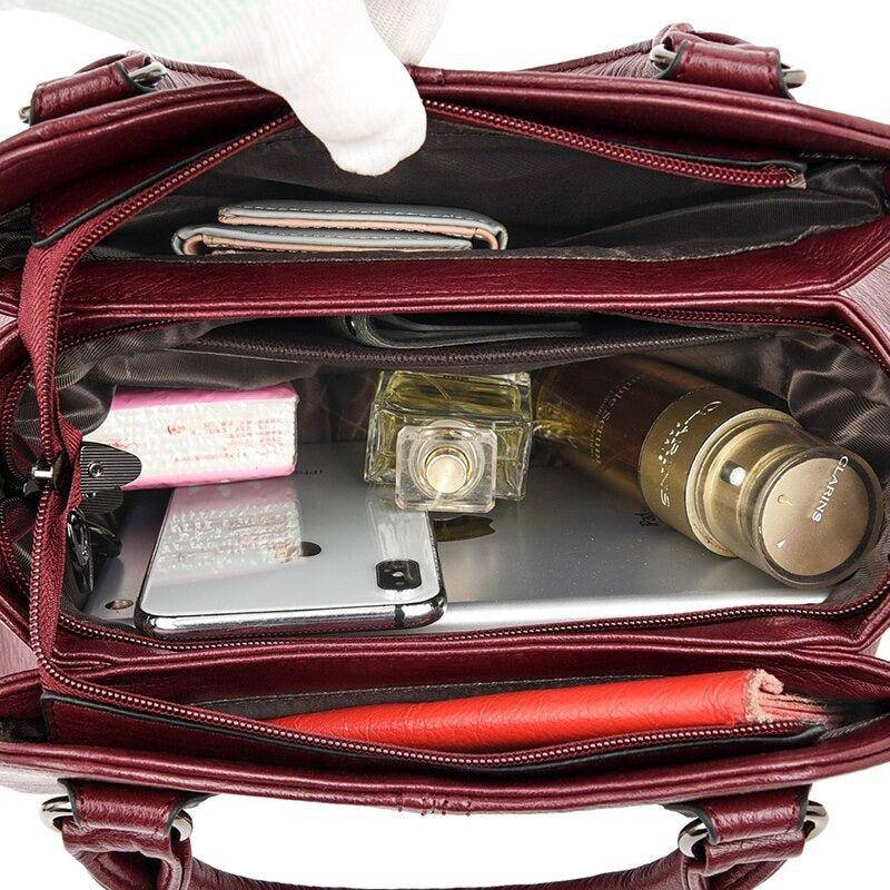 شنطة يد نسائية جلدية فاخرة بتصميم أنيق وعصري - بني - KSA