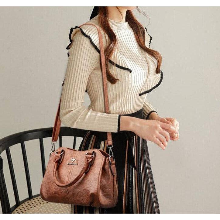 شنطة يد نسائية جلدية فاخرة بتصميم أنيق وعصري - بني - KSA