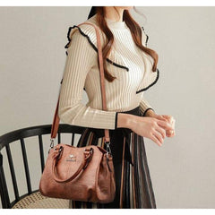 شنطة يد نسائية جلدية فاخرة بتصميم أنيق وعصري - بني - KSA