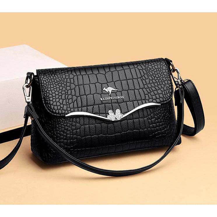 شنطة يد عملية بخامات جلدية مميزة وتصميم عصري - أسود - KSA