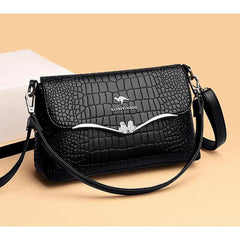 شنطة يد عملية بخامات جلدية مميزة وتصميم عصري - أسود - KSA