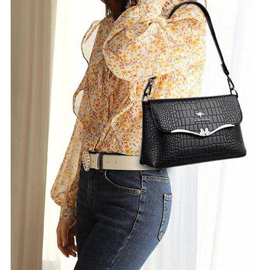 شنطة يد عملية بخامات جلدية مميزة وتصميم عصري - أسود - KSA