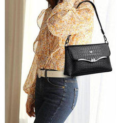 شنطة يد عملية بخامات جلدية مميزة وتصميم عصري - أسود - KSA