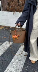 حقيبة يد نسائية صغيرة لون بني بيد قصيرة - KSA