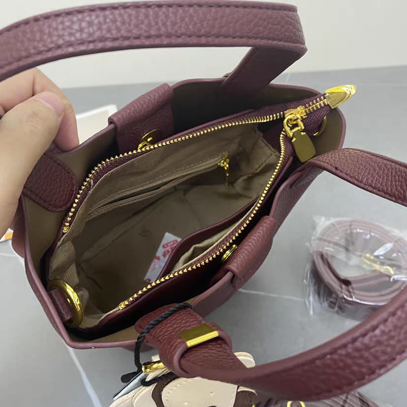 حقيبة يد نسائية كبيرة باللون البني بيد قصيرة - KSA