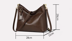 حقيبة كتف متوسطة الحجم بجيب خارجي لون اسود وذراع اضافي