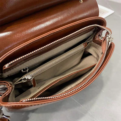 حقيبة يد نسائية صغيرة الحجم مع تعليقة دب لون اسود - KSA