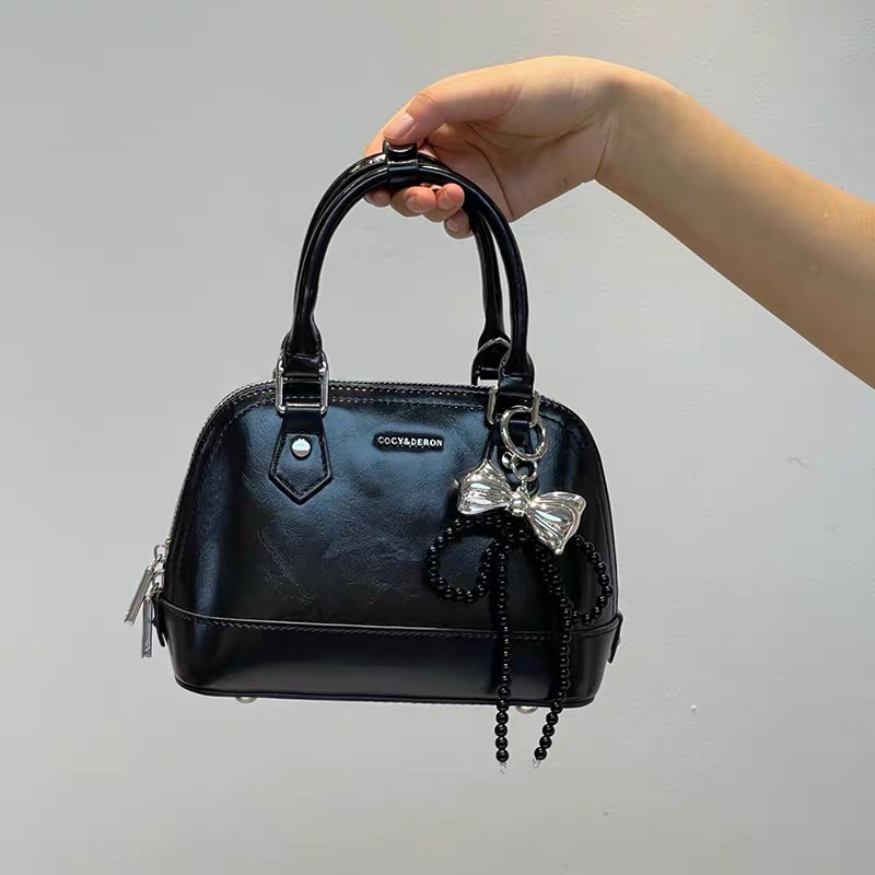 حقيبة يد نسائية صغيرة الحجم تصميم دوم لون اسود - KSA