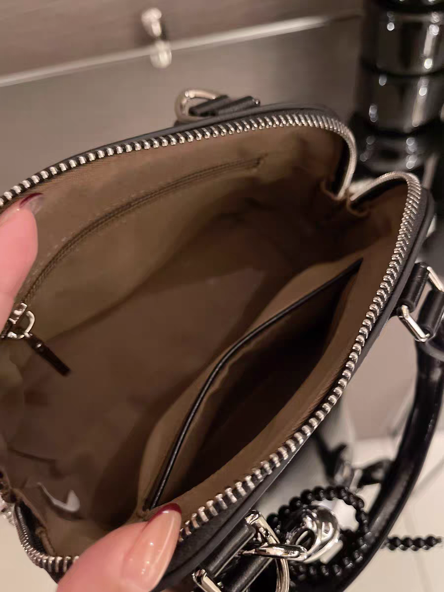 حقيبة يد نسائية صغيرة الحجم تصميم دوم لون عنابي - KSA